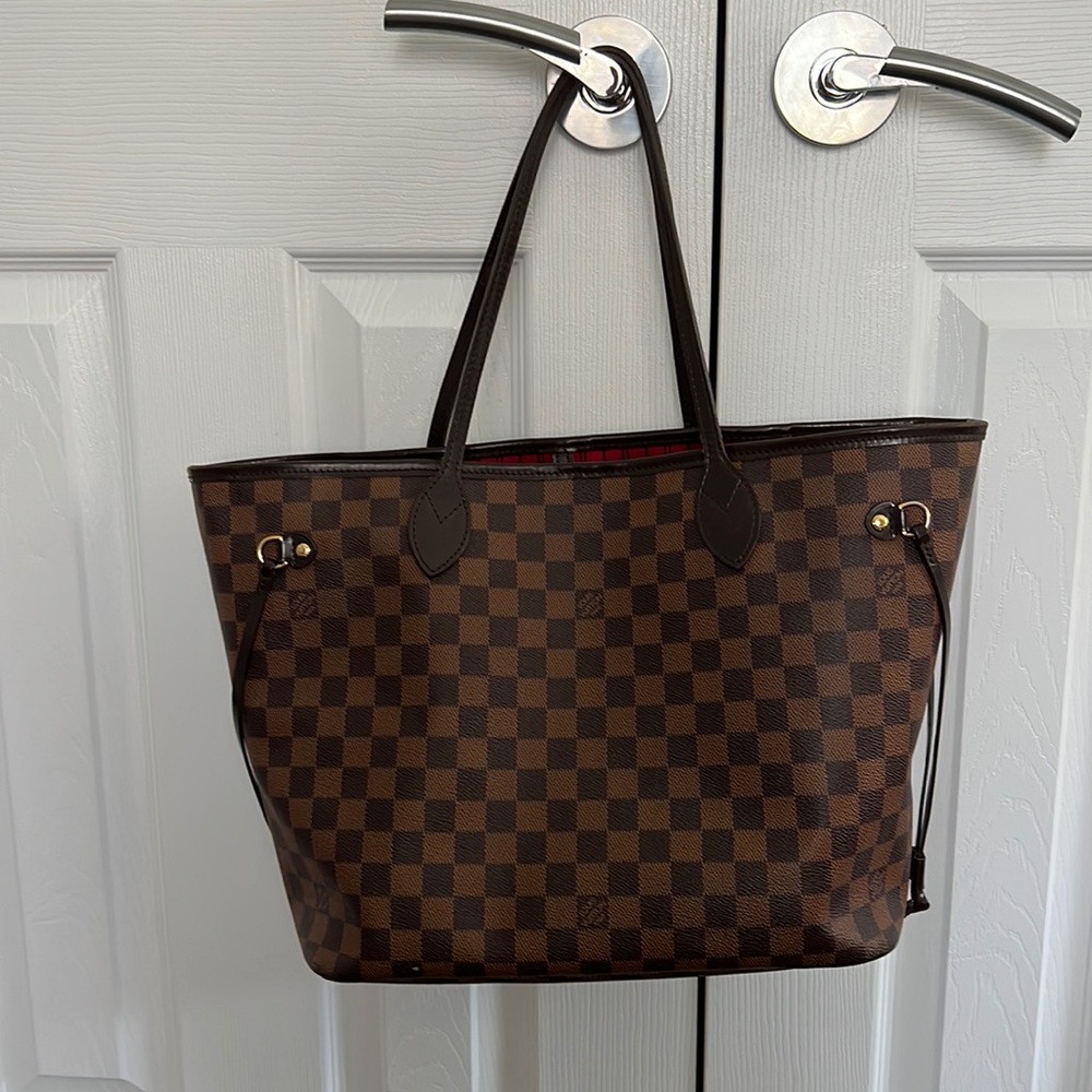 Louise Vuitton Never full